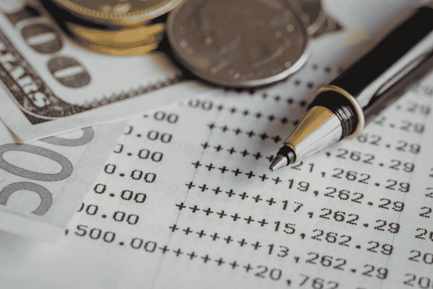 Financial records and bank documents highlighting the importance of keeping long-standing accounts open to improve credit score