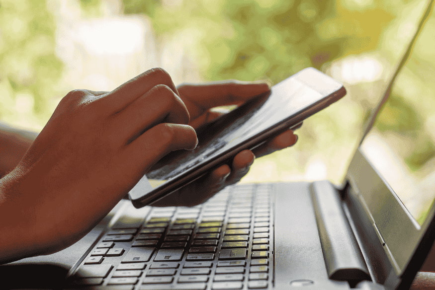 Using a smartphone for online banking with secure login features, highlighting digital banking security in the US